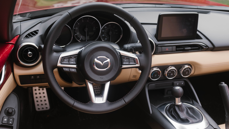 Illustration for article titled 2019 Mazda Miata VS. 2018 Volkswagen Golf GTI: Which To Buy?